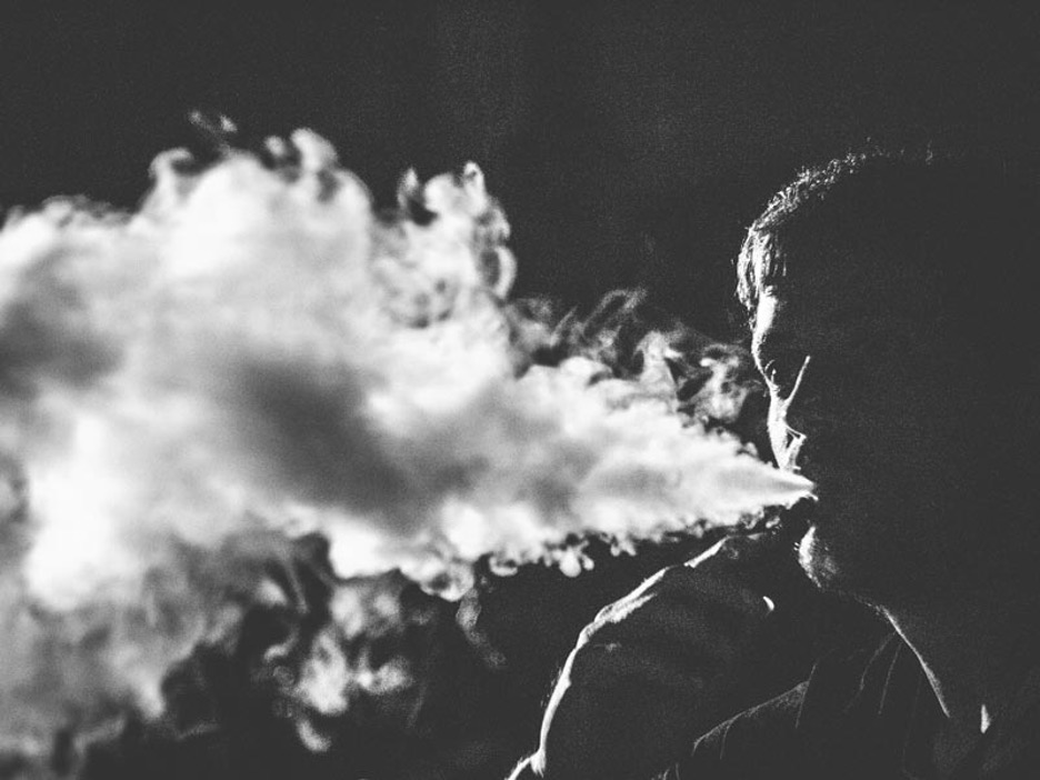 A picture containing text, outdoor, dark
